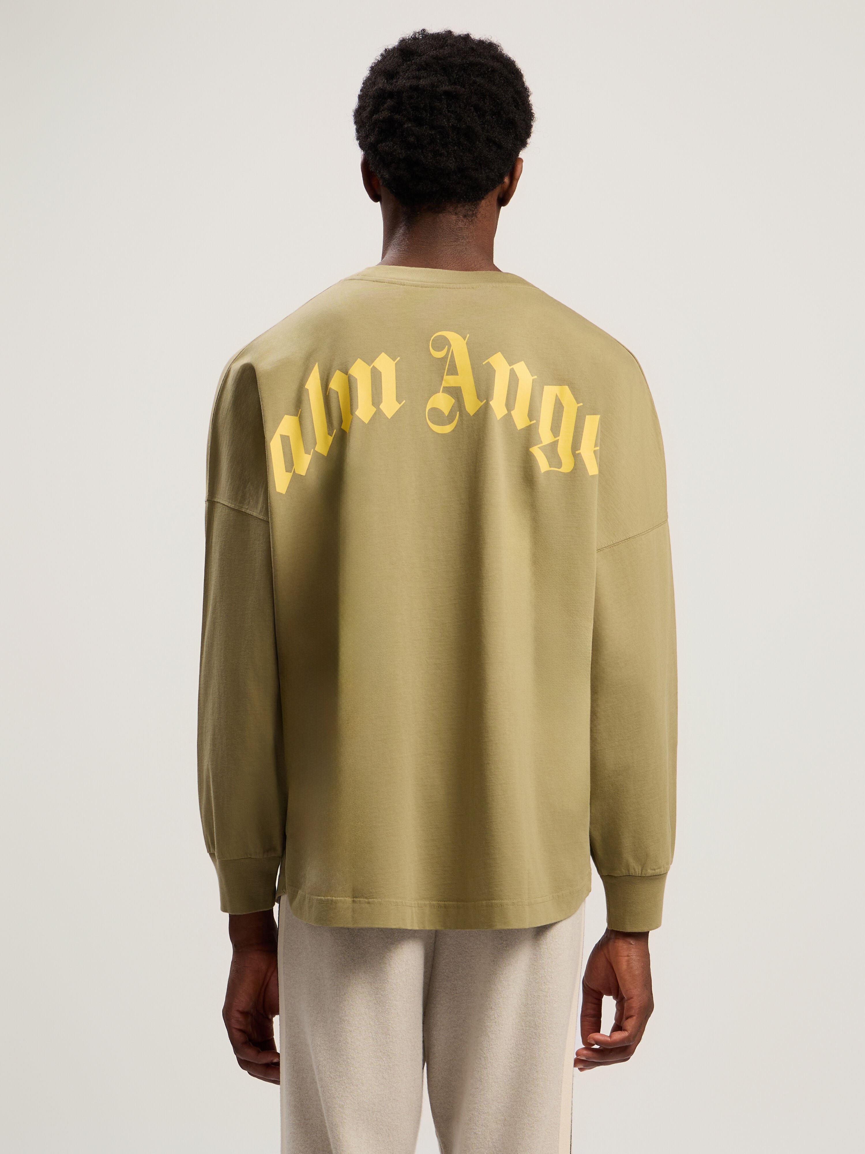 Curved Logo Long Sleeve T-Shirt PALM ANGELS Curved Logo Long Sleeve T-Shirt ARMY GREEN - YELLOW PMAB059F25JER001