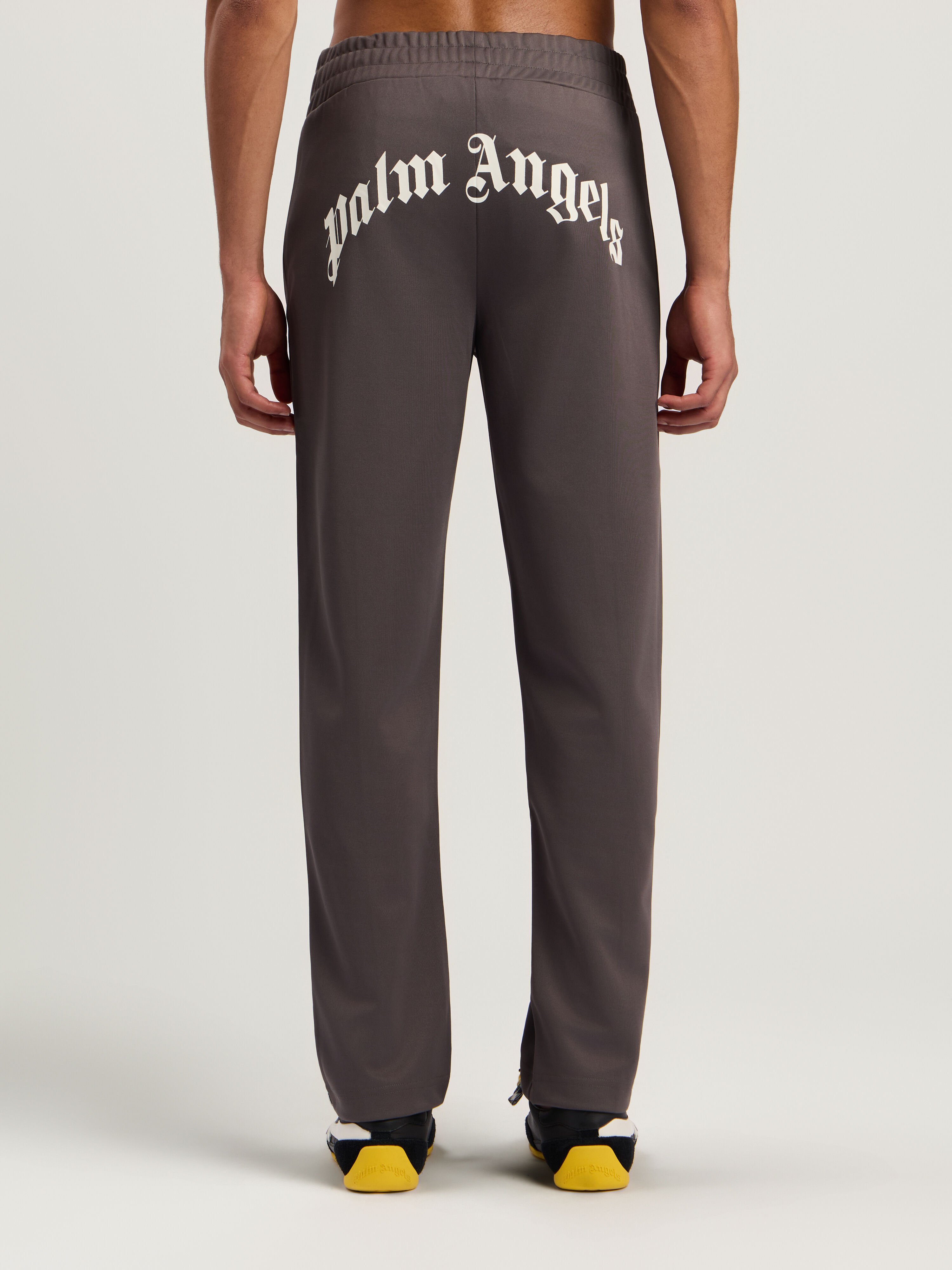 PALM ANGELS Curved Logo Track Pants DARK GREY - OFF WHITE PMCJ048F25FAB001