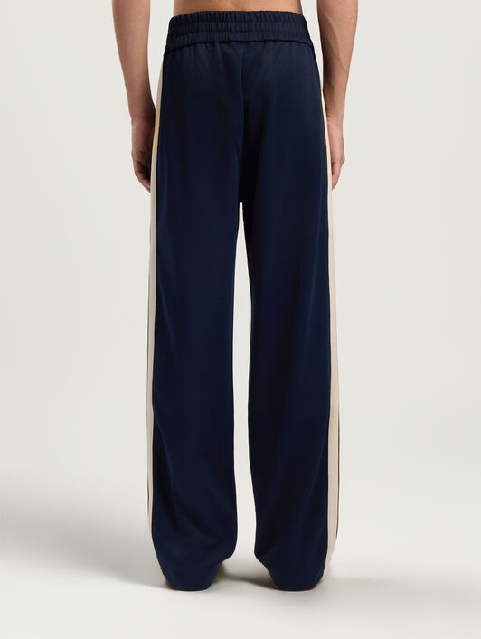 Classic Logo Zip-Up Track Pants PALM ANGELS Classic Logo Zip-Up Track Pants DARK BLUE - OFF WHITE PMCJ04HF25FAB001