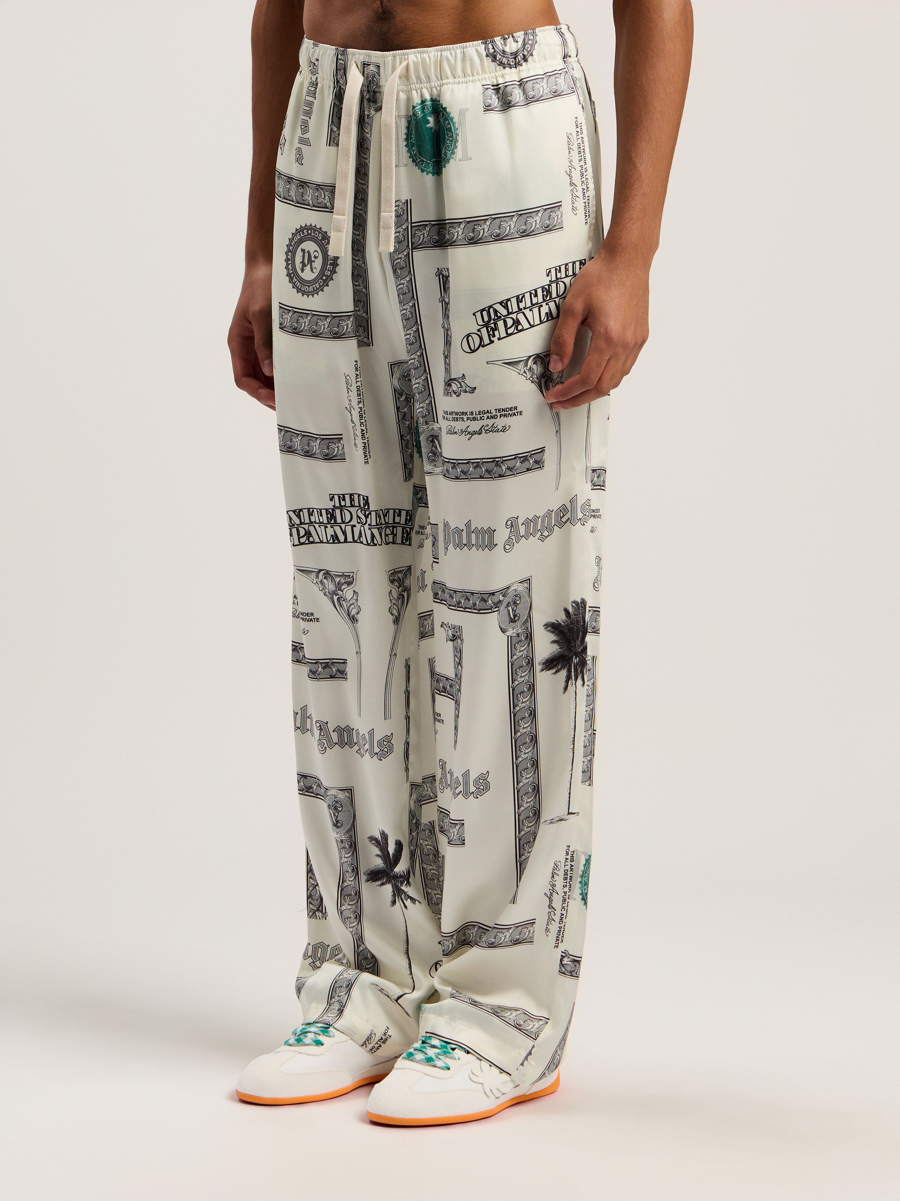 Dollar Print Wide-Leg Pants PALM ANGELS Dollar Print Wide-Leg Pants IVORY - BLACK PMCA143F25FAB001
