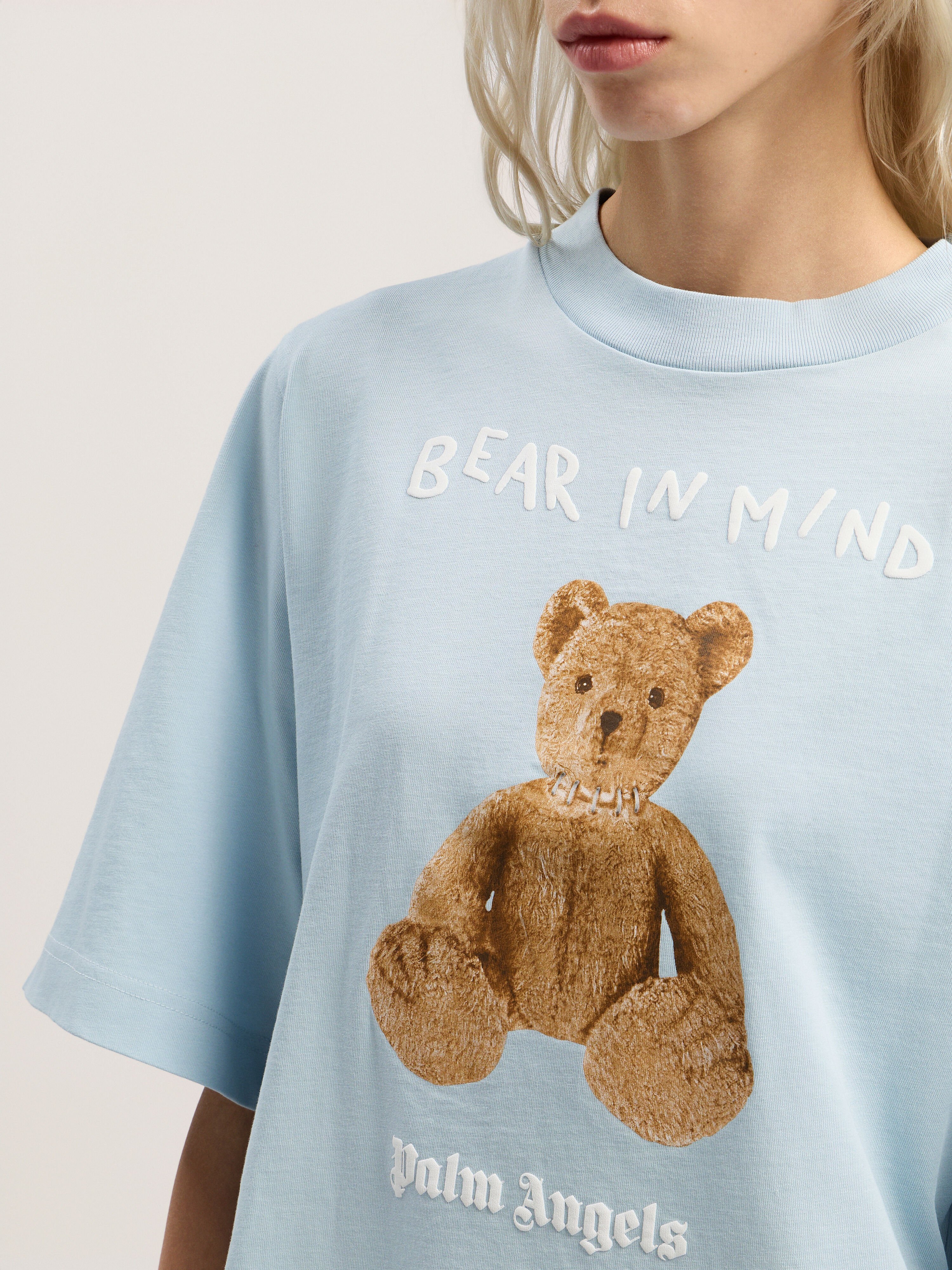 Bear In Mind Cropped Tee PALM ANGELS Bear In Mind Cropped Tee BABY BLUE - BROWN PWAA079F25JER002
