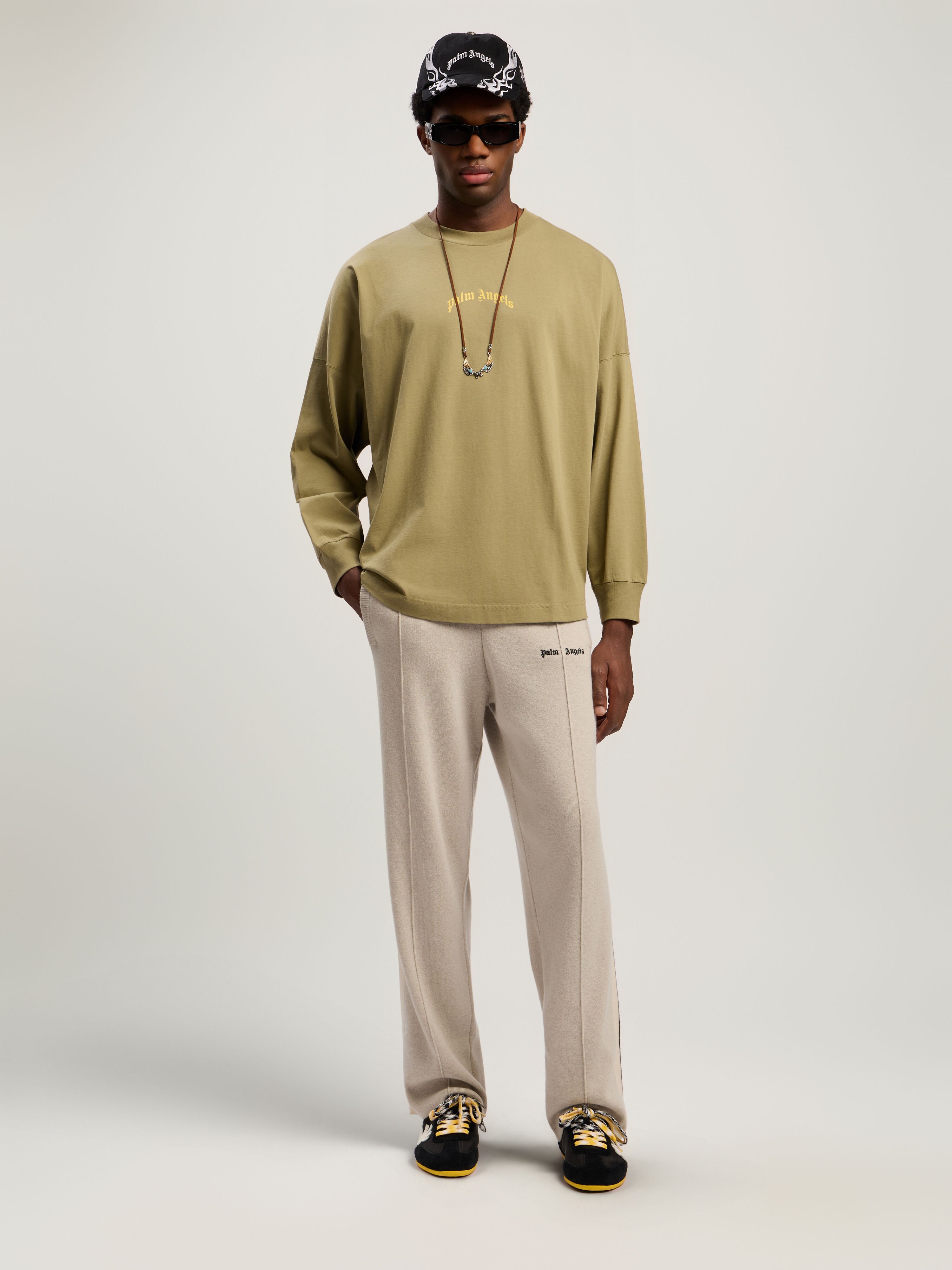 Curved Logo Long Sleeve T-Shirt PALM ANGELS Curved Logo Long Sleeve T-Shirt ARMY GREEN - YELLOW PMAB059F25JER001