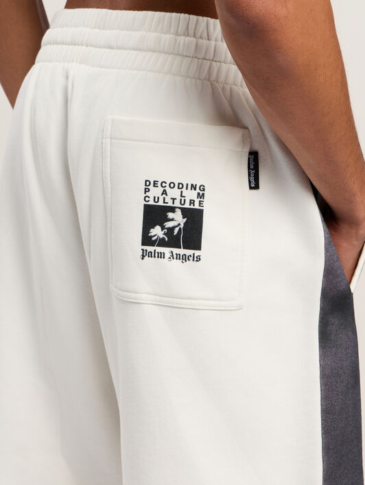 Decoding Palm Culture Sweatshort PALM ANGELS Decoding Palm Culture Sweatshort OFF WHITE - BLACK PMCI019F25FLE002