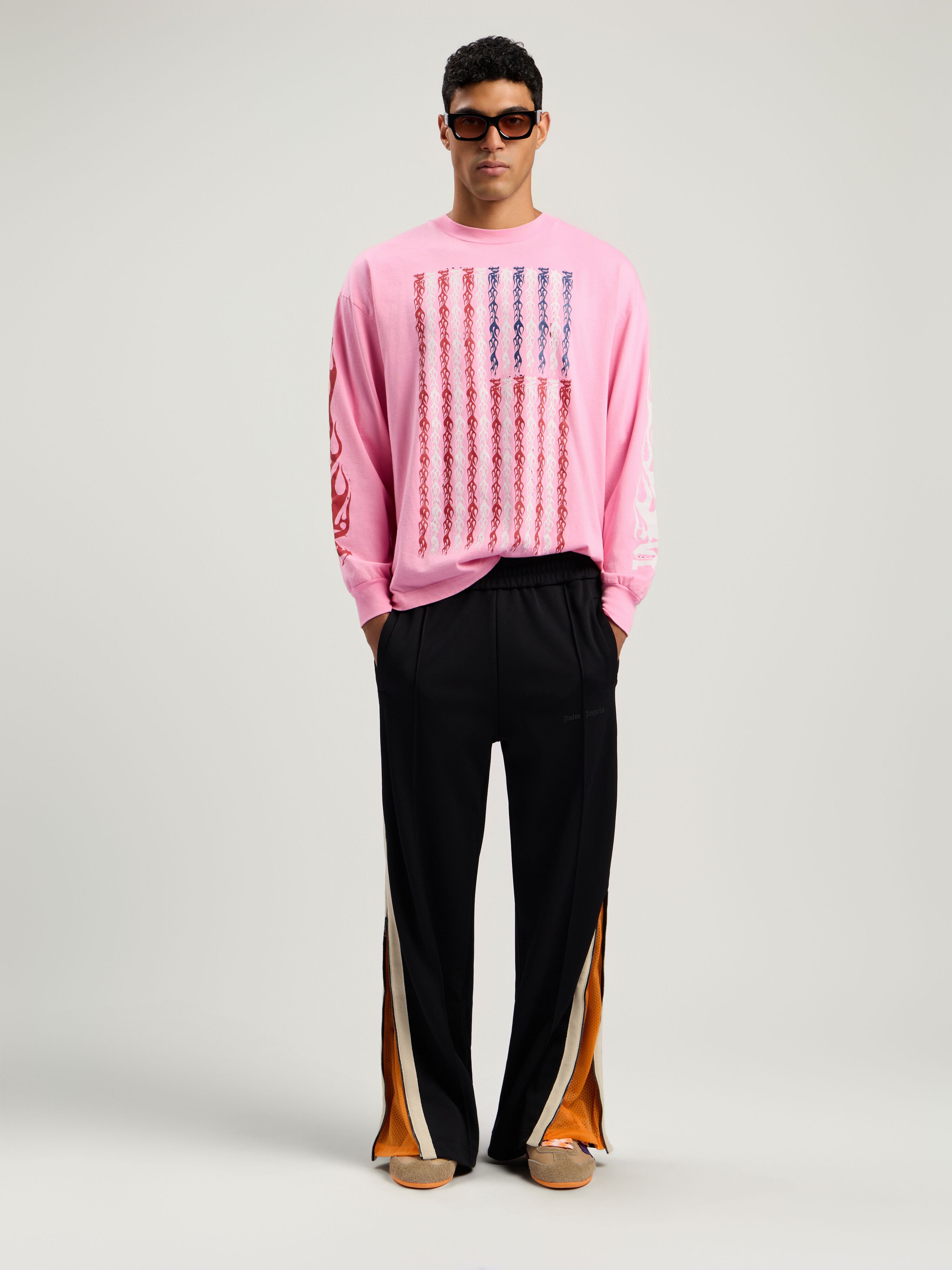 Performance Zip-Up Track Pants PALM ANGELS Performance Zip-Up Track Pants BLACK - ORANGE PMCJ04EF25FAB001