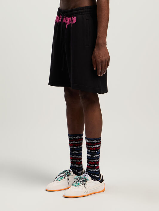 PALM ANGELS Sprayed Logo Sweatshorts BLACK - FUCHSIA PMCI019F25FLE003