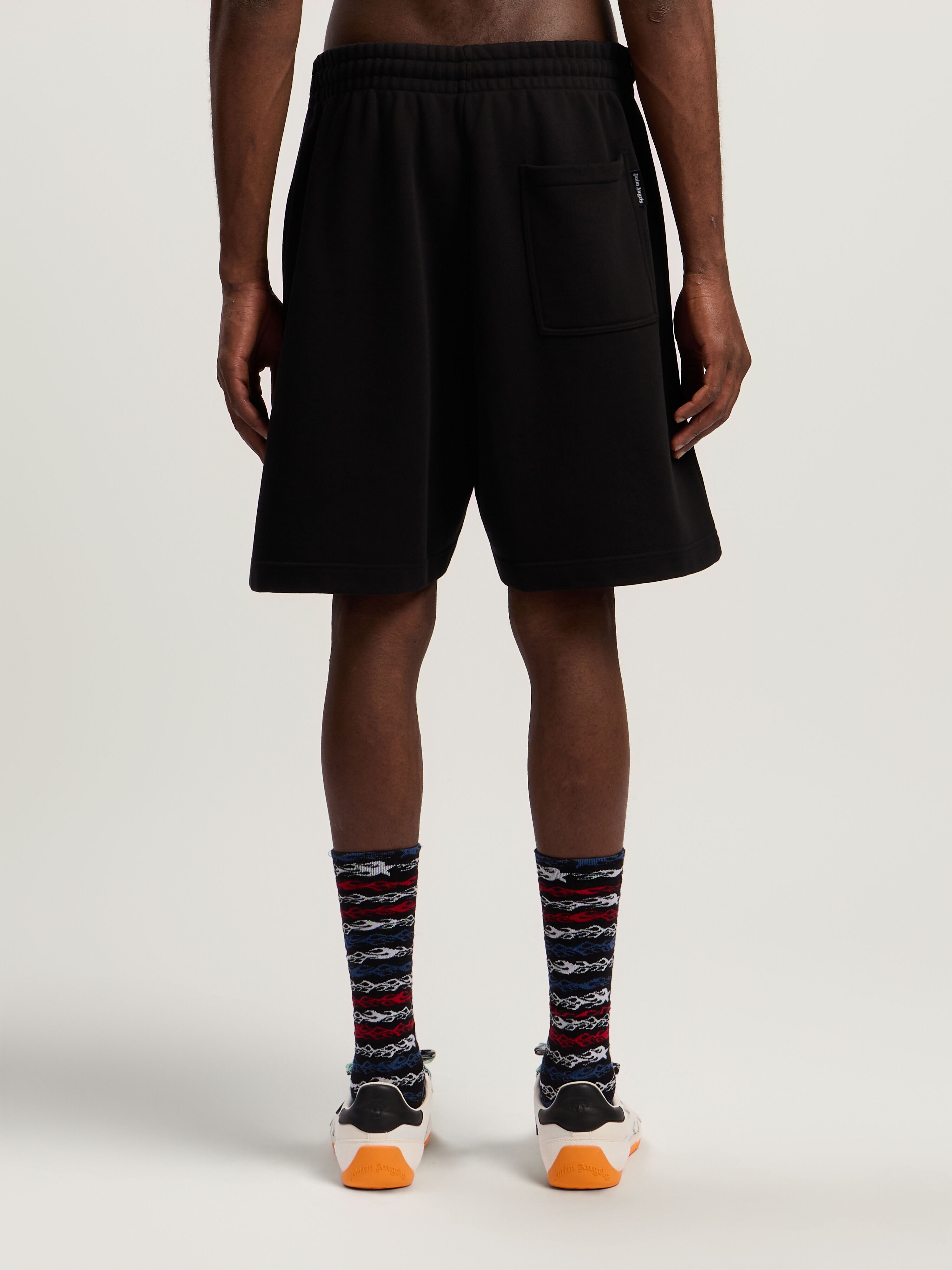 PALM ANGELS Sprayed Logo Sweatshorts BLACK - FUCHSIA PMCI019F25FLE003