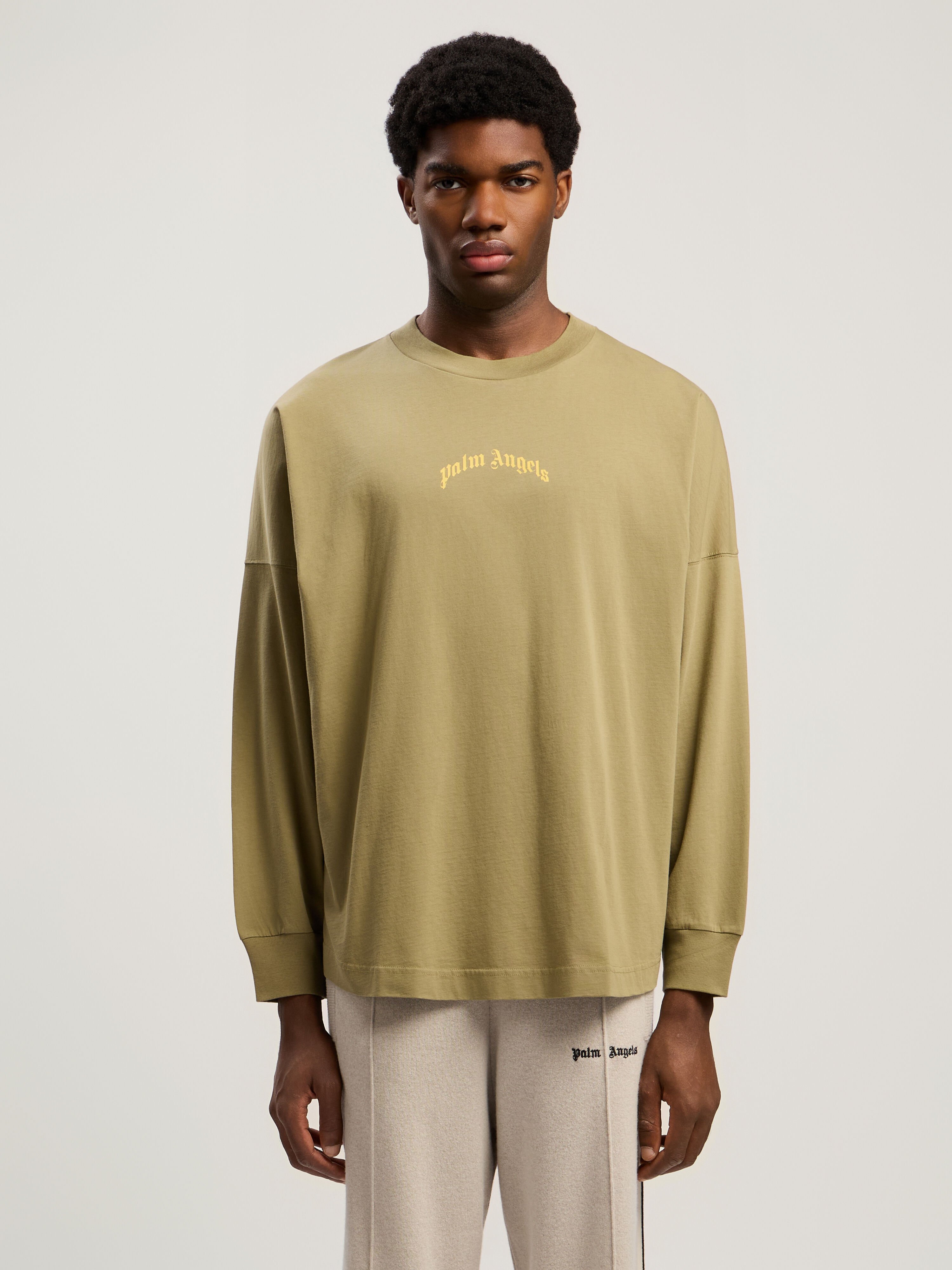 Curved Logo Long Sleeve T-Shirt PALM ANGELS Curved Logo Long Sleeve T-Shirt ARMY GREEN - YELLOW PMAB059F25JER001